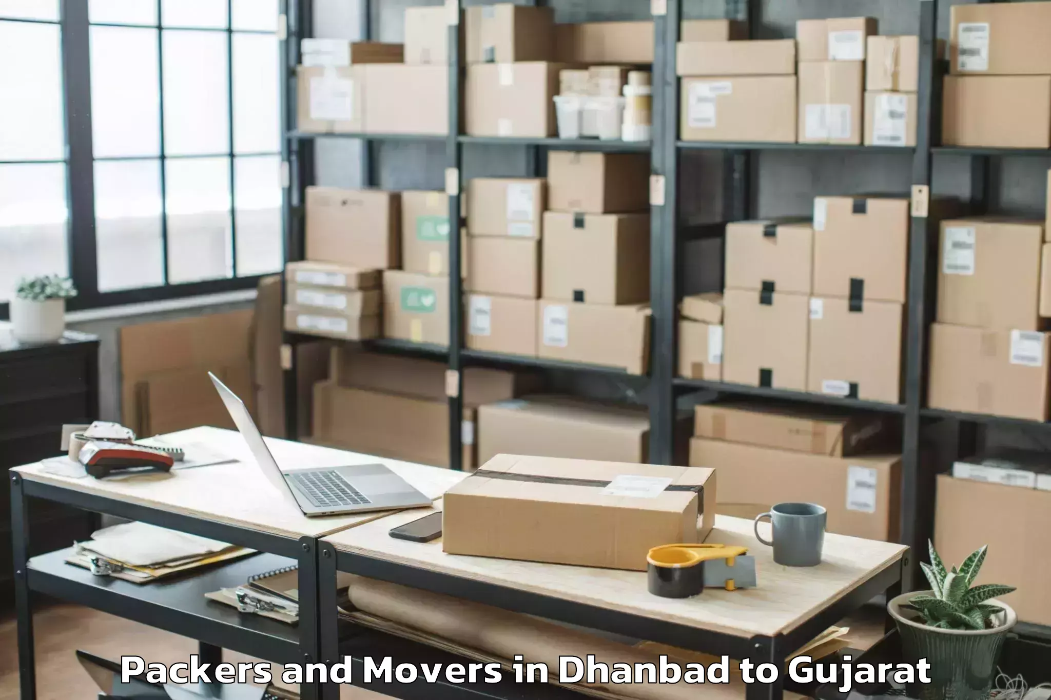 Get Dhanbad to Lakulish Yoga University Ahmed Packers And Movers